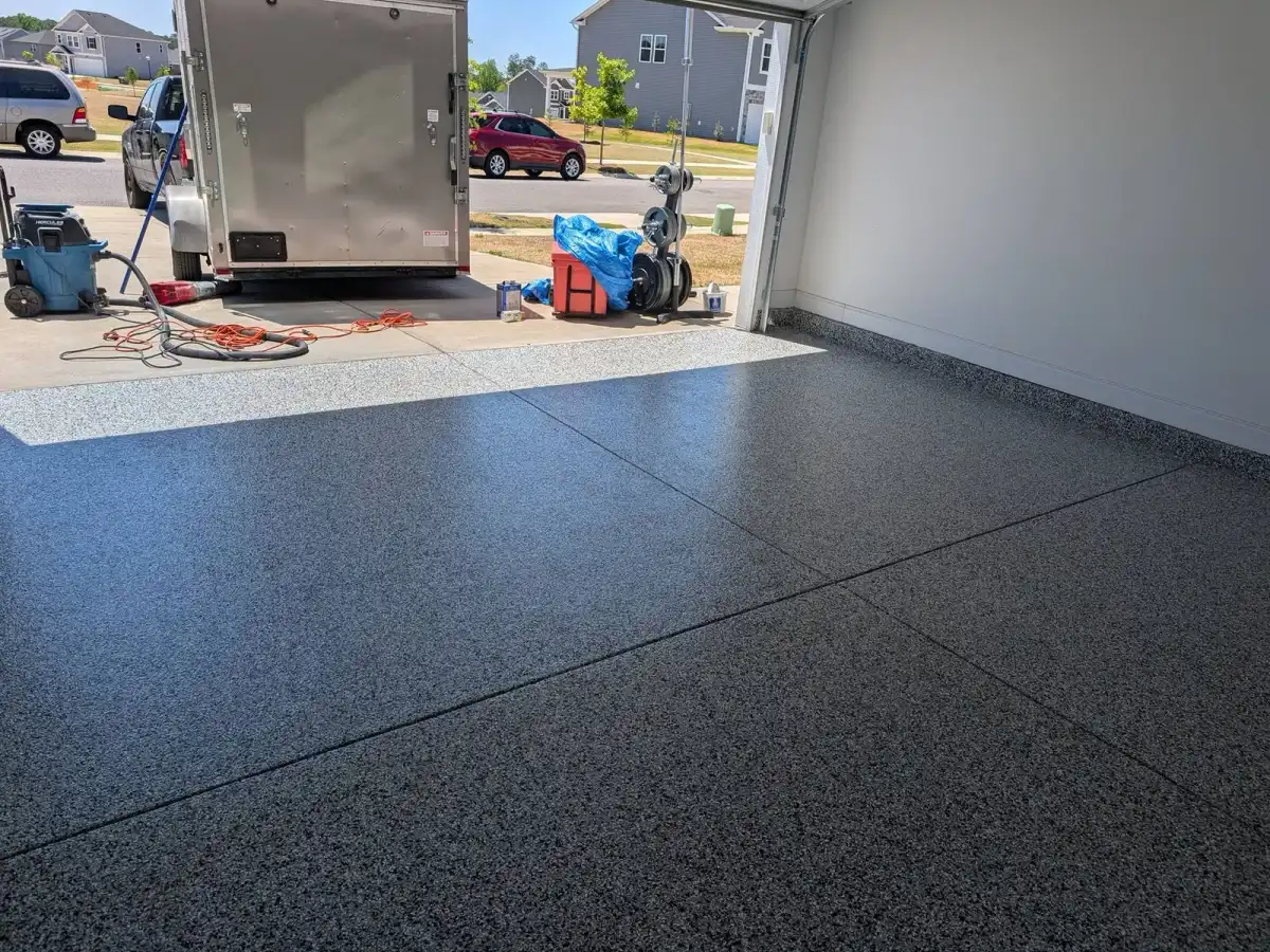 Gray flake garage floor with the door open