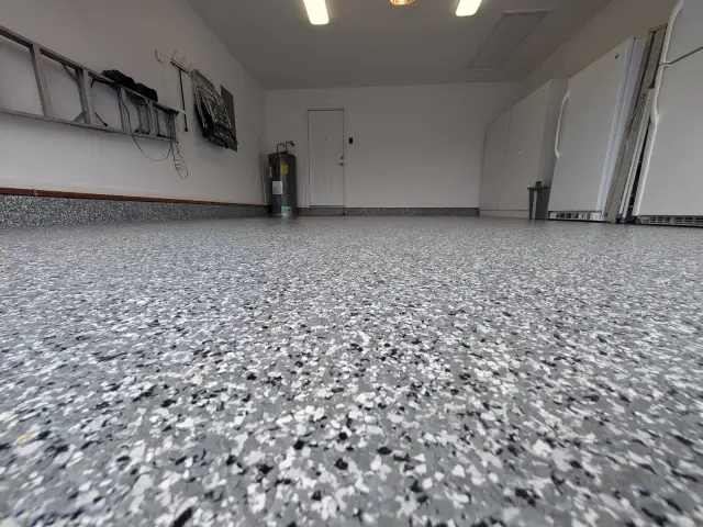 Close view of a full-broadcast flake floor