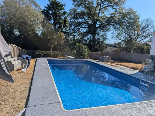 Pool deck coating around an in-ground pool
