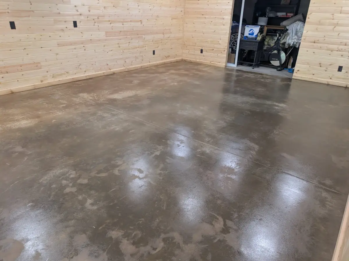 Ground and sealed natural concrete