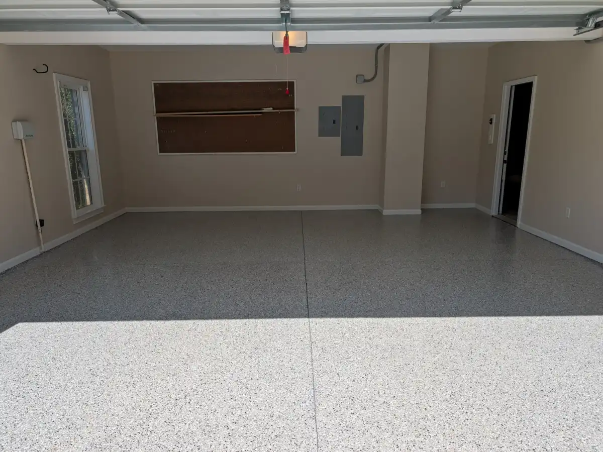 Finished coated floor by By His Grace Epoxy Flooring