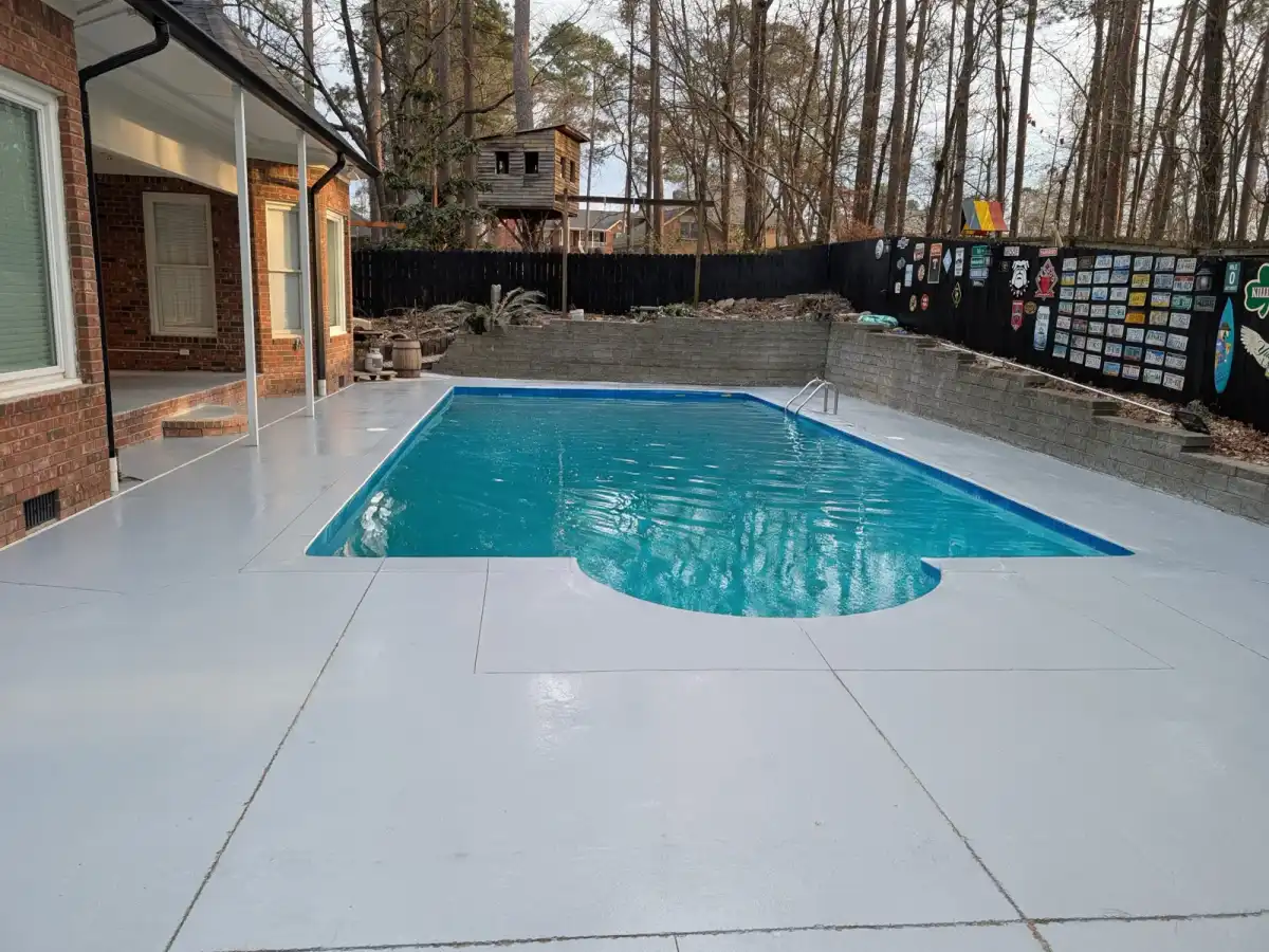 Finished coated floor by By His Grace Epoxy Flooring