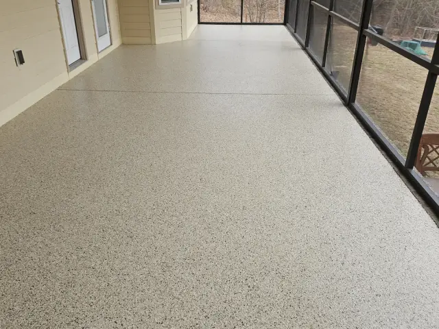 Light flake floor on a long screened porch