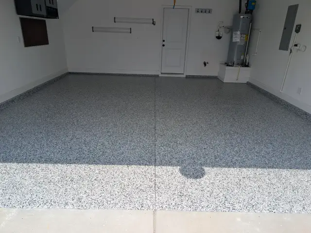 Wide view of a light flake garage
