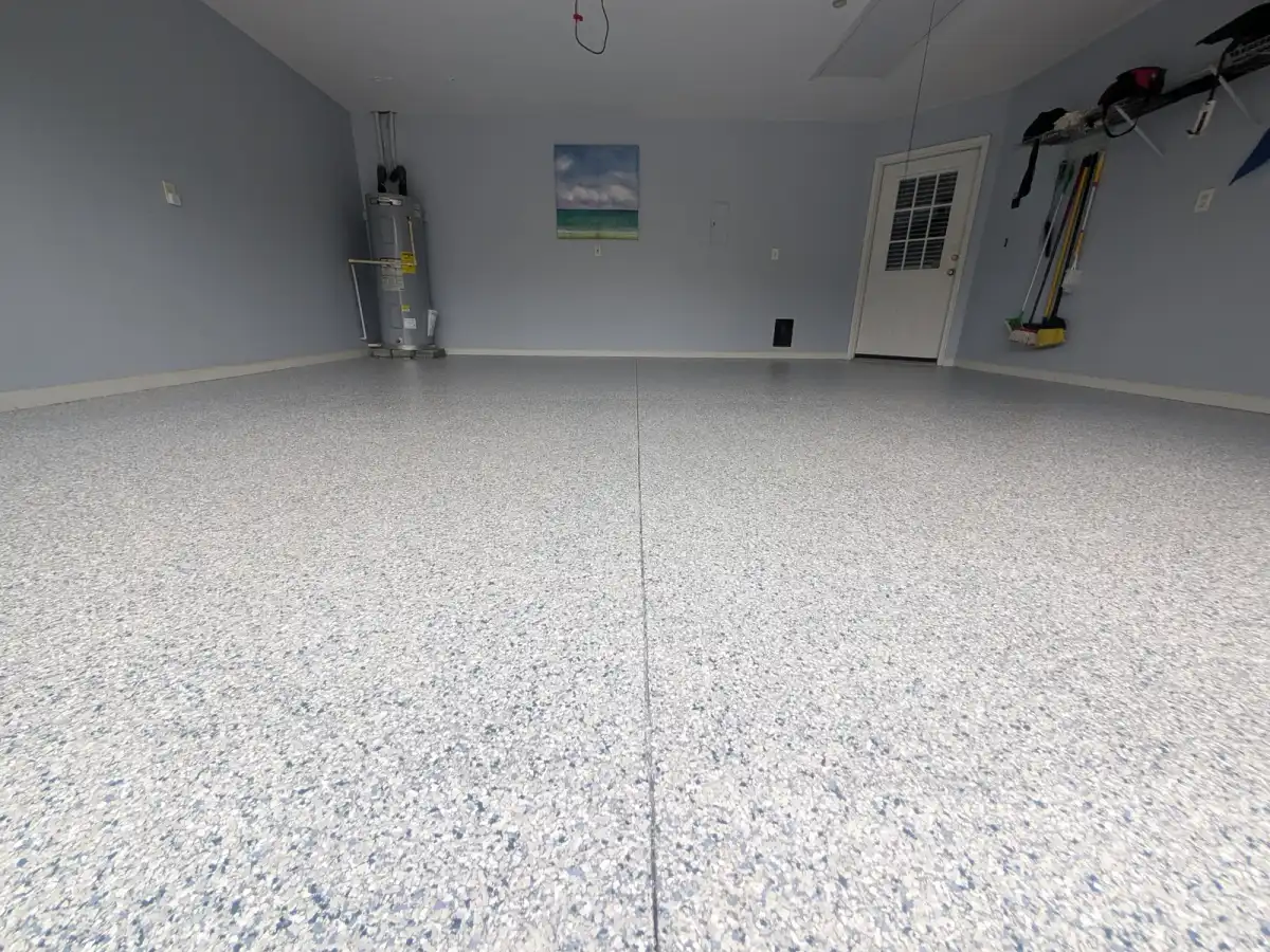 Finished coated floor by By His Grace Epoxy Flooring